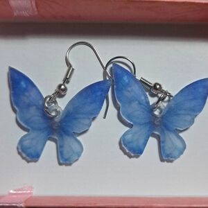 Blue butterfly drop earrings